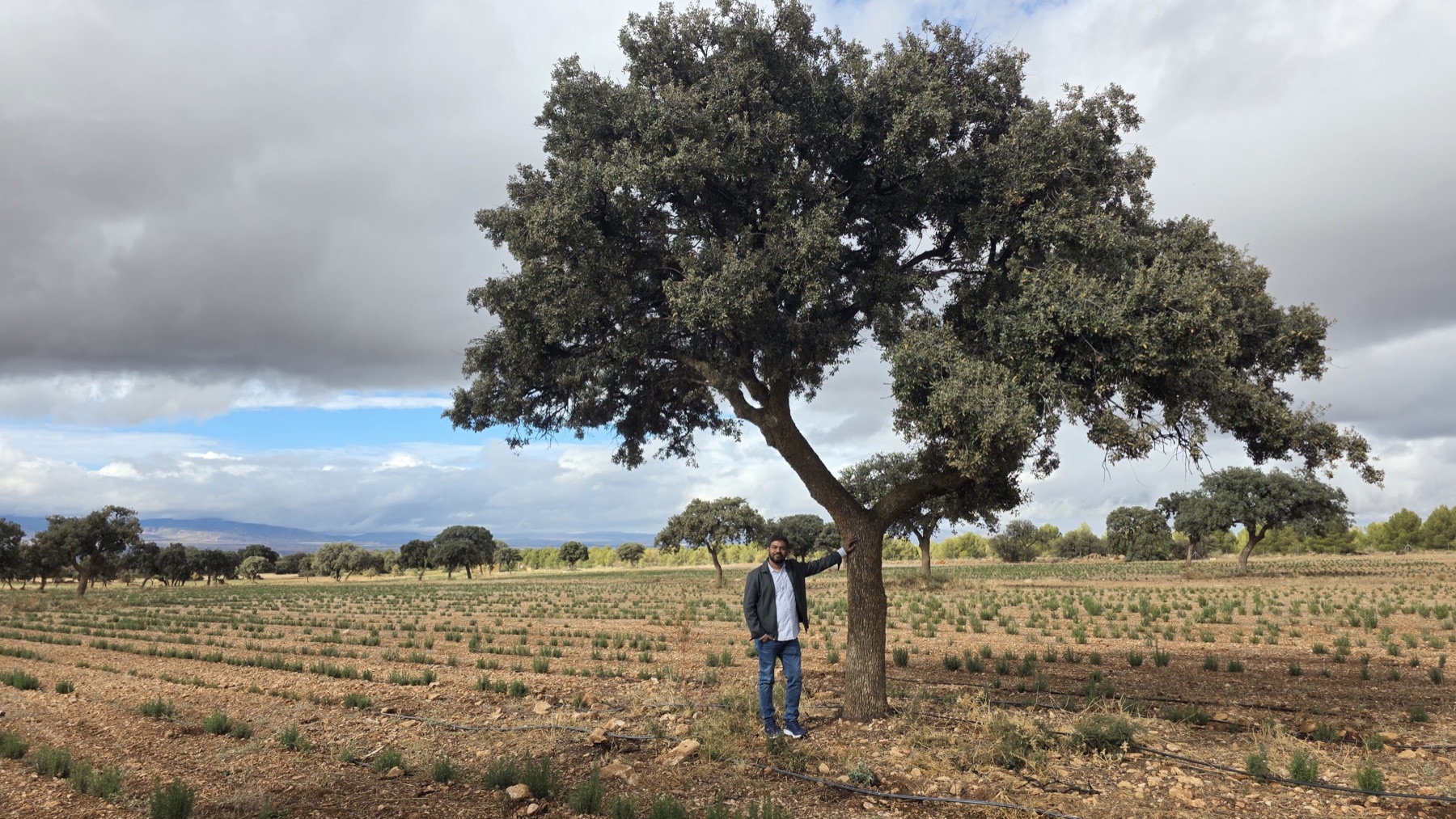 AromaSetu founder Anubhab Satapathy visiting an aromatic crop farm